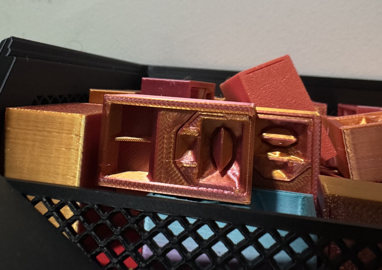 Mini F1 speaker keychains, fresh from the print batch.