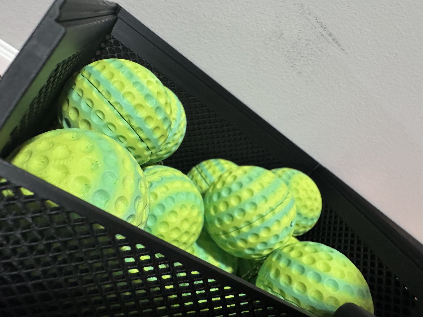 Green and yellow stash balls. The seam is where the two halves unscrew.